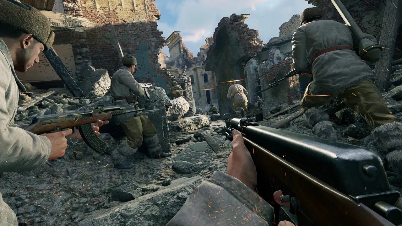 First-person view of an infantry squad with submachine guns pushing through a ruined town in Enlisted