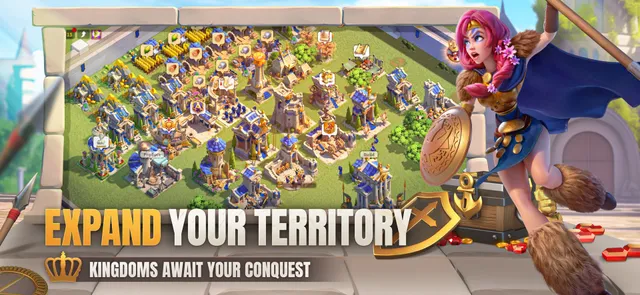Aerial view of a sprawling city with blue-roofed buildings and mountains behind in Rise of Kingdoms
